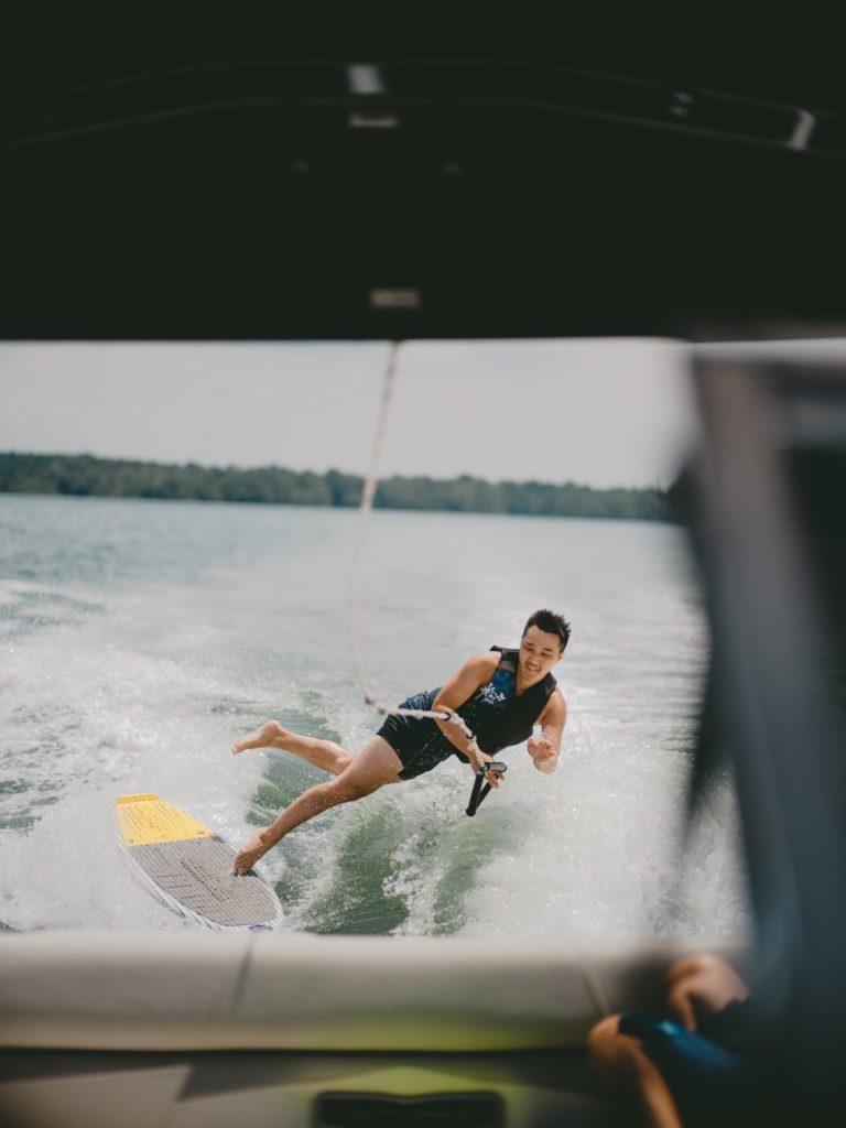 wakesurfer, wakesurfing, smiling, having fun